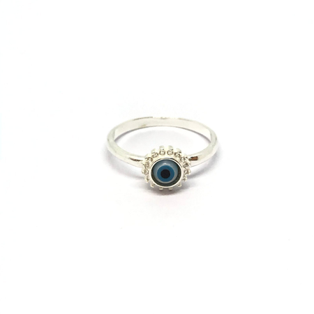 Anillo con ojito y cubic en bordes