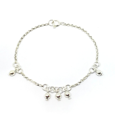 Pulsera rolo con bolitas colgantes