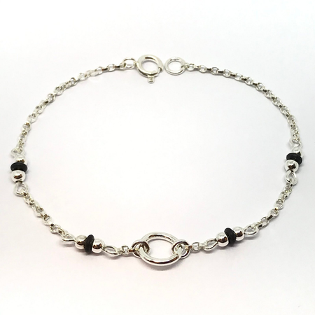 Pulsera combinada con caucho y bolitas