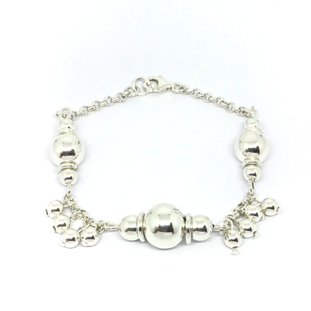 Pulsera rolo con combinacion de bolas colgantes