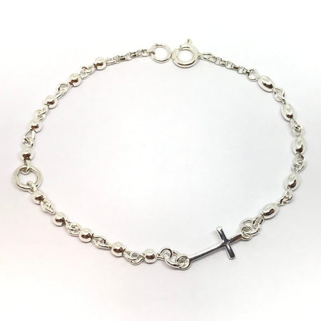 Pulsera con cruz, semillitas y bolitas combinadas