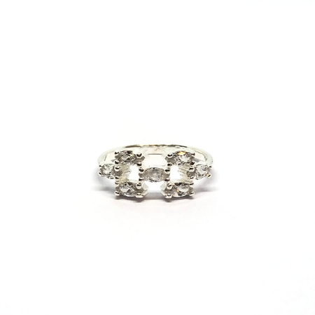 Anillo con cubics ovalados combinados