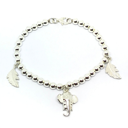 Pulsera de bolitas y colgantes varios