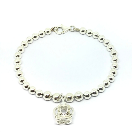 Pulsera con bolitas y corona colgante