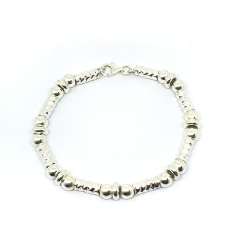 Pulsera de canuto con bolitas