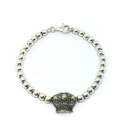 Pulsera con bolitas y corona colgante