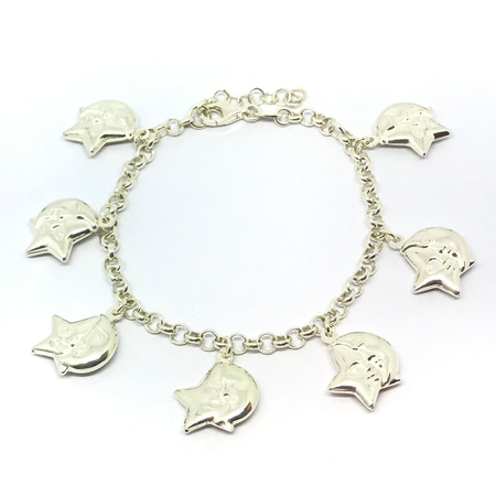Pulsera rolo con dijes inflados de luna y estrella