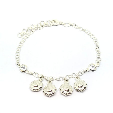 Pulsera con cubic y soles colgantes